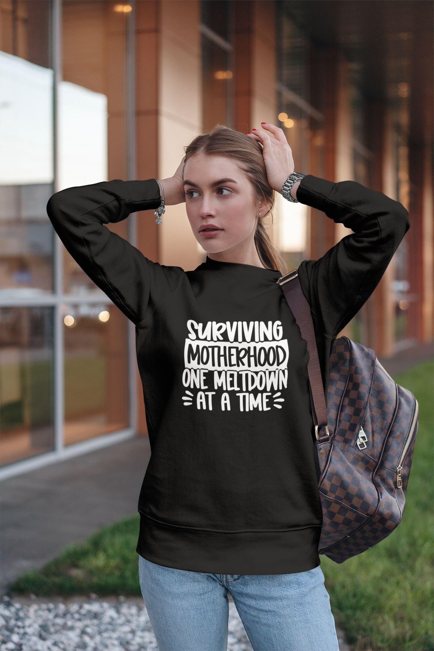 Surviving Motherhood one Meltdown at a time Sweatshirt