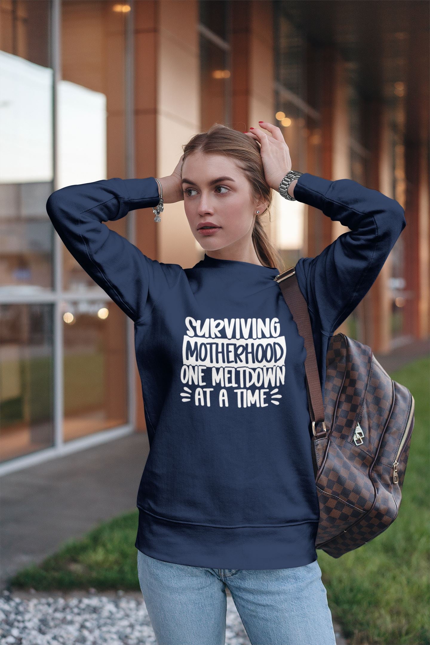 Surviving Motherhood one Meltdown at a time Sweatshirt
