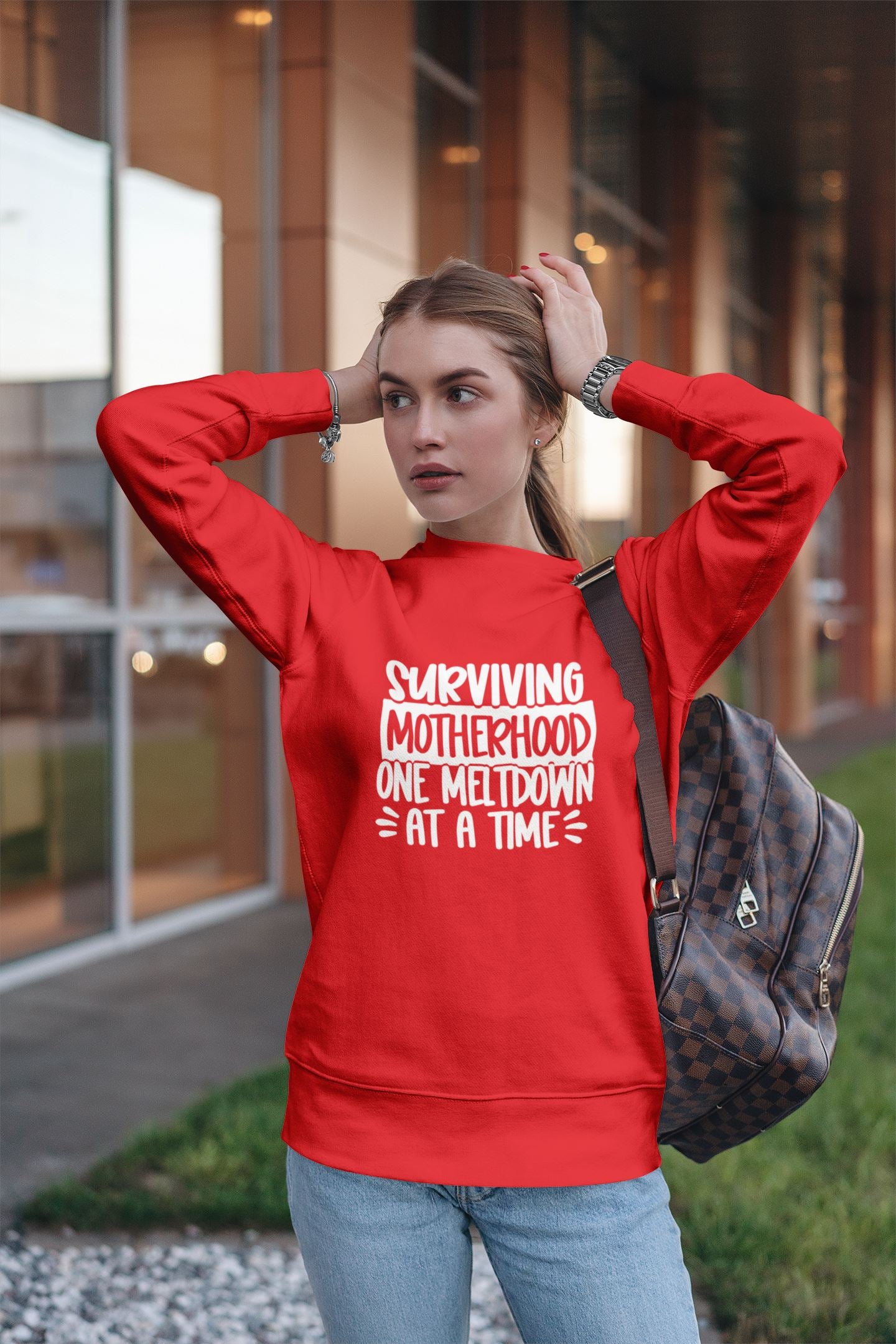 Surviving Motherhood one Meltdown at a time Sweatshirt